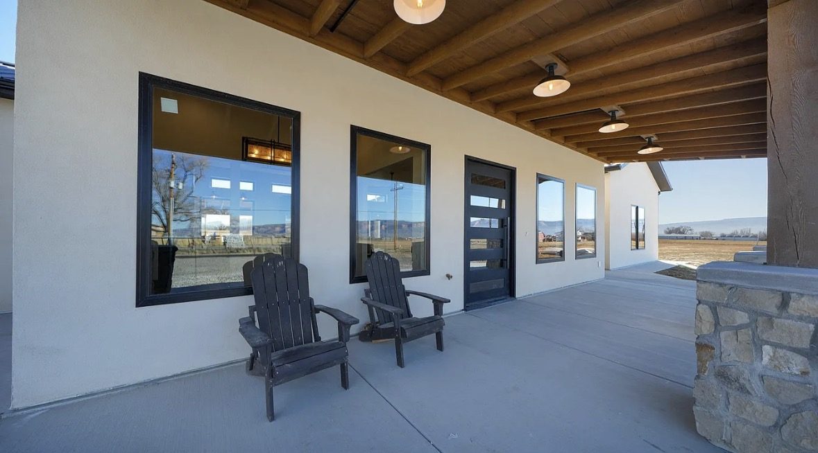 Long covered porch with timber posts